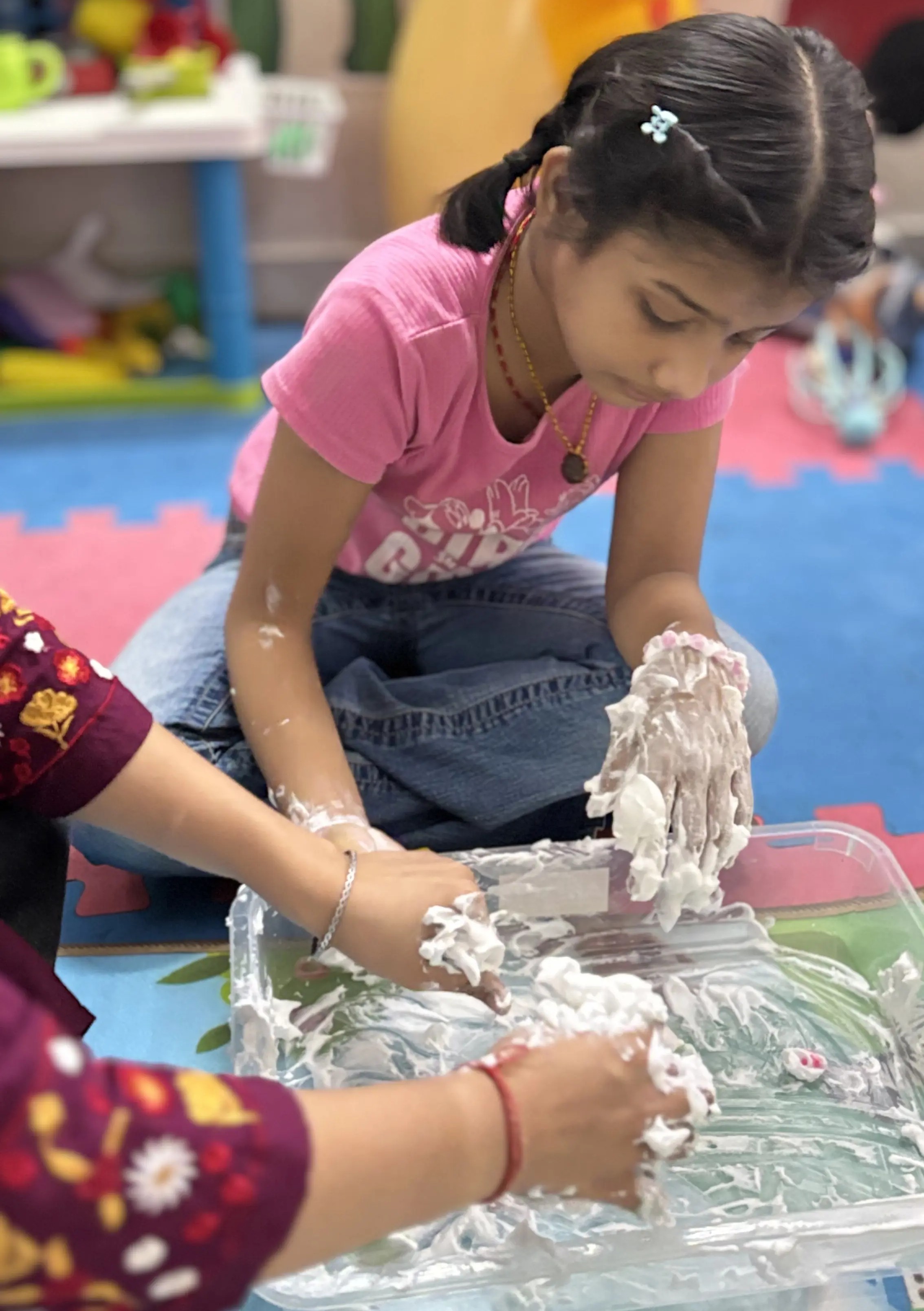 Children playing in the centre's play area